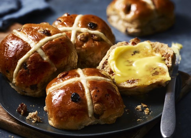 Luxury Fruited Hot Cross Buns from M&S on a plate with butter